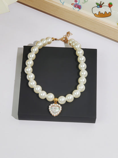 elegant faux-pearl pet necklace adding refined charm from Puff Paw